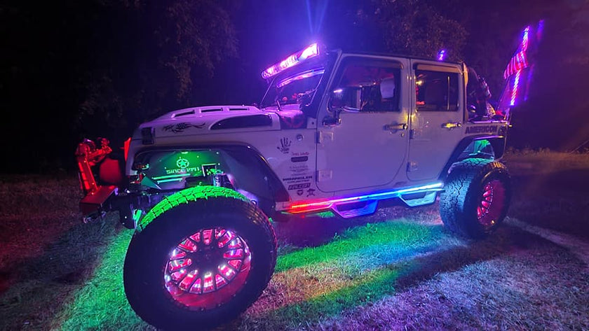 Nicoko 8 Pack RGB LED Chasing Multicolor Neon Rock Lights with 216 LEDs 8 Extension Underglow Wire Kit with APP/RF Flashing Music Wheel Well Control Lighting with Halo IP68 for Off-Road Car,Truck